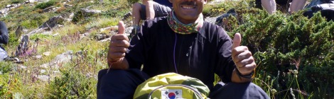 A smiling Dorje Khatri gives the thumbs up on the way to Cho Oyu
